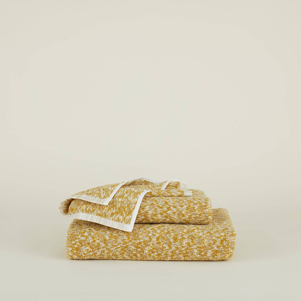 Space Dye Terry Towel in Mustard. -Nested